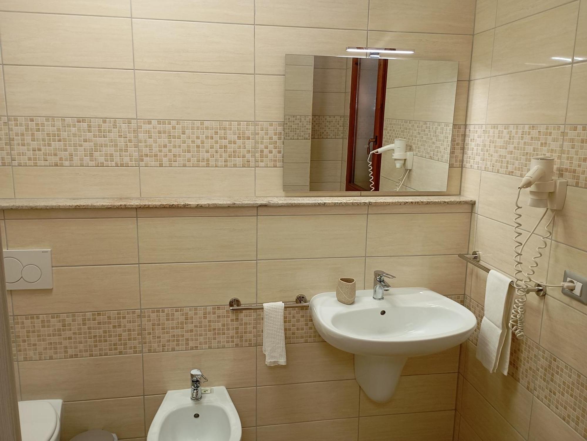 Hotel Meridiana Arbus Buitenkant foto